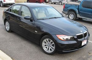 BMW 325 xi, темно серого цвета, салон  цвета слоновой кости