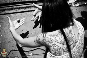 татуировку