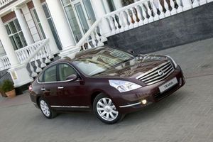 Машину Nissan ))
