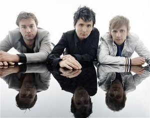 Сходить на концерт Muse