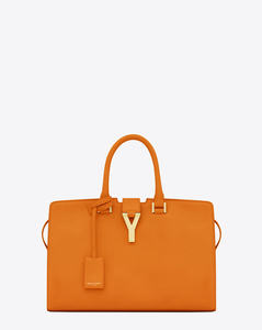оранжевую сумку