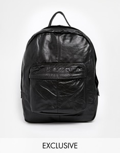 Черный кожаный рюкзак