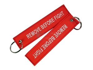 Брелок красный "Remove Before Fight"