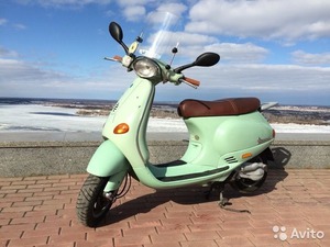 Vespa мятного цвета