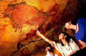 Поразглядывать наскальную живопись в пещере Альтамира