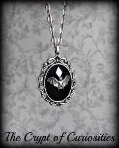 Gothic silver and black bat cameo necklace.