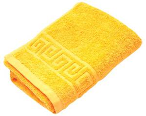 Желтое полотенце для тела