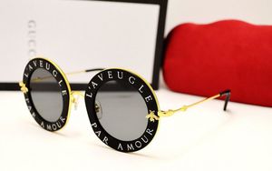 GUCCI EYEWEAR солнцезащитные очки в круглой оправе