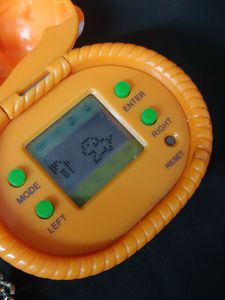 MGA VR Creatures Puppy Tamagotchi Virtual Pet