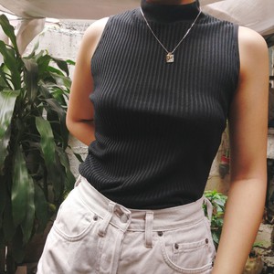 black sleeveless turtleneck