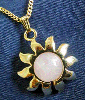 кулон в форме солнца