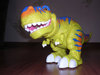 игрушку динозавра
