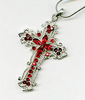 Серебрянный крест с красными камнями