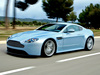 Машину  Aston Martin