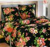 постельное белье с яркими цветами на черном фоне