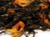 Вкусный чёрный чай с кусочками фруктов, ягод и специями