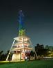 To see Tower of Light at night