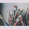 Paintbrushes and colours.