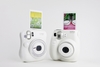 The Instax Mini 7s or Mini 25 Instant Cameras