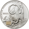 Монета со вставкой элемента настоящего бивня доисторического мамонта