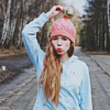 Hat with large pompom