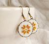 Cross stitch earrings Ethnic geometrical flower in golden yellow