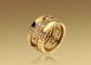 Bulgari PARENTESI large band ring in 18kt yellow gold with demi pav&#233; diamonds