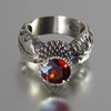 BLOOMING THISTLE ring with Garnet