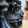 Научиться играть в шахматы