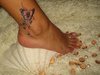 татуировку на ноге