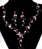 Комплект "Эдельвейс" от Arrina, ожерелье и серьги-пусеты. Кристаллы аметистового цвета, бижутерный сплав золотого тона. Гонконг,