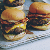 Cook burgers on the grill for Jamie Oliver recipe