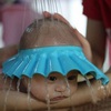 Шапочка для купания младенцев