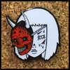 Death mask enamel pin