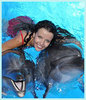 Плавать с дельфинами