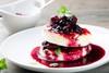 Sirniki in berry sauce