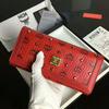 MCM Gold Visetos Trifold Long Wallet In Red