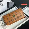 MCM Color Visetos Trifold Wallet In Brown