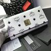 MCM Color Visetos Trifold Leather Wallet In White