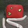 MICHAEL Michael Kors Cindy Hearts Leather Crossbody Red