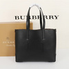 Burberry Embossed Monogram Motif Leather Tote In Black