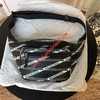Balenciaga Allover Cross Logo Beltpack In Black