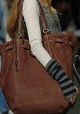сумку бааашую))) очень)вроде произведений Fendi под названием Spy или чемоданчиков Louis Vuitton