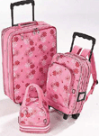 большой розовый чемодан