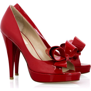 Red peep-toe pumps