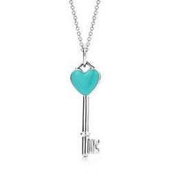 Tiffany heart key charm with blue enamel finish in sterling silver